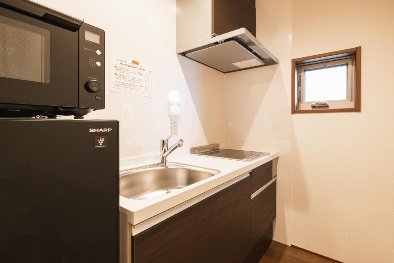 Aparthotel Grand Base Hakata Gofuku à Fukuoka  Extérieur photo