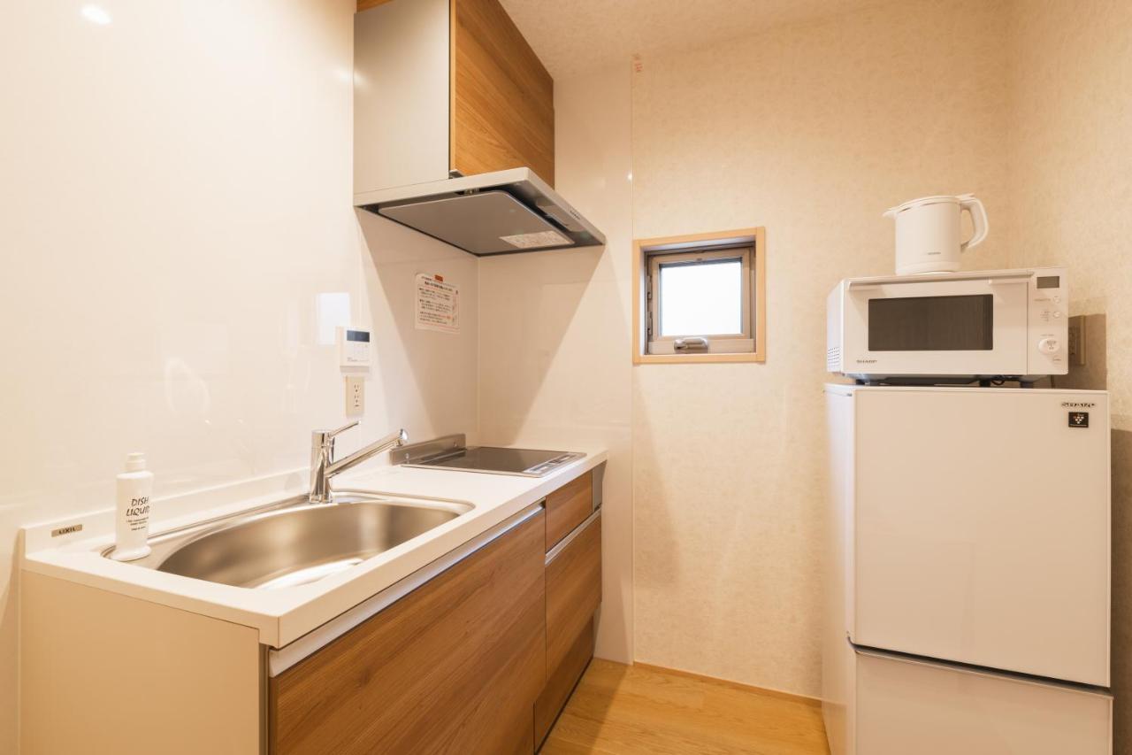 Aparthotel Grand Base Hakata Gofuku à Fukuoka  Extérieur photo